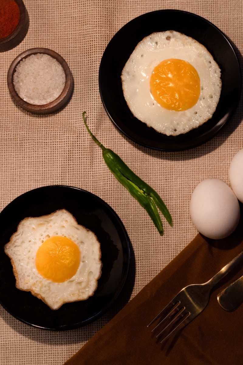 Two sunny delight  eggs in two plates.