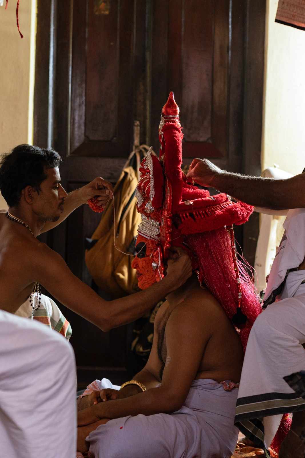 Theyyam artist getting ready for transformation
