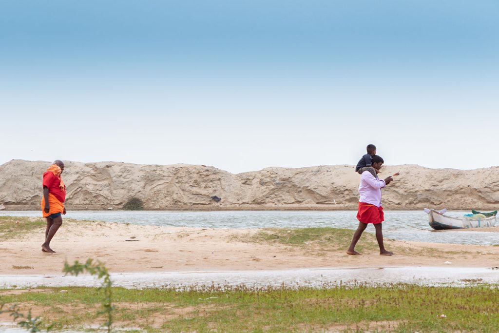 two journeys Two men walking near the beach.