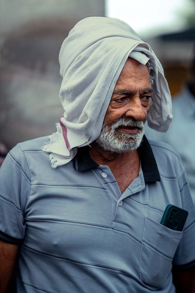 Portrait of old fisherman showing wisdom.