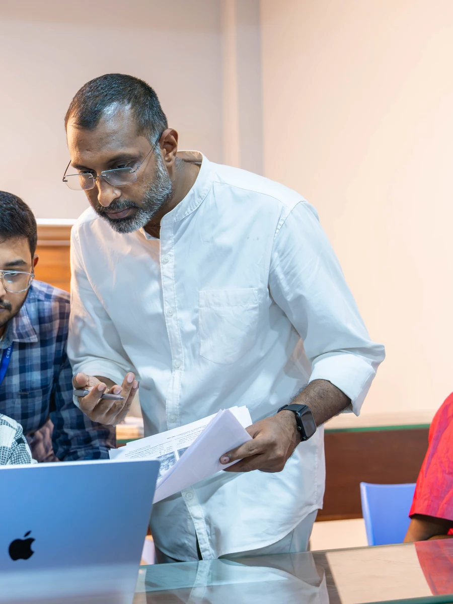 Abin Alex, AI filmmaker and film educator, founder of Creative Hut Academy, reviewing work with students
