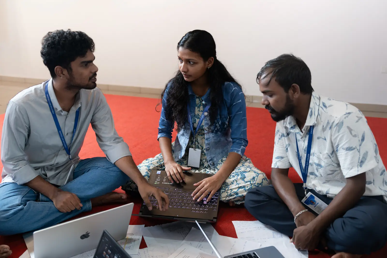AI content creation career: students working together on a laptop at Creative Hut Academy