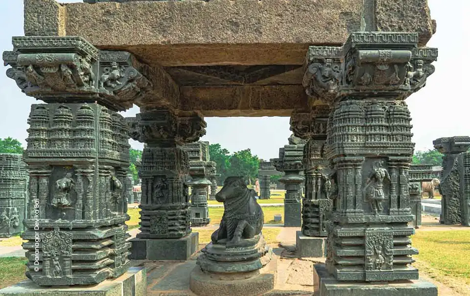 Carved stone pillars with a seated Nandi, architecture photograph by Devika Guntur, Creative Hut Academy