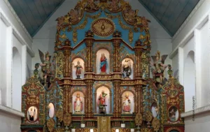 Gilded church altar with carved saints, architecture photograph by Pavan Kilaparthi, Creative Hut Academy