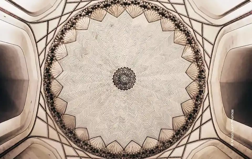 Intricate dome ceiling seen from below, architecture photograph by Aman John Thomas, Creative Hut Academy